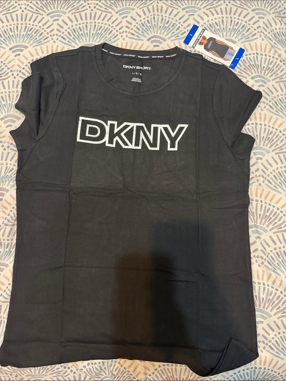 Women’s size Large DKNY Black short sleeve T-Shirt with White Logo